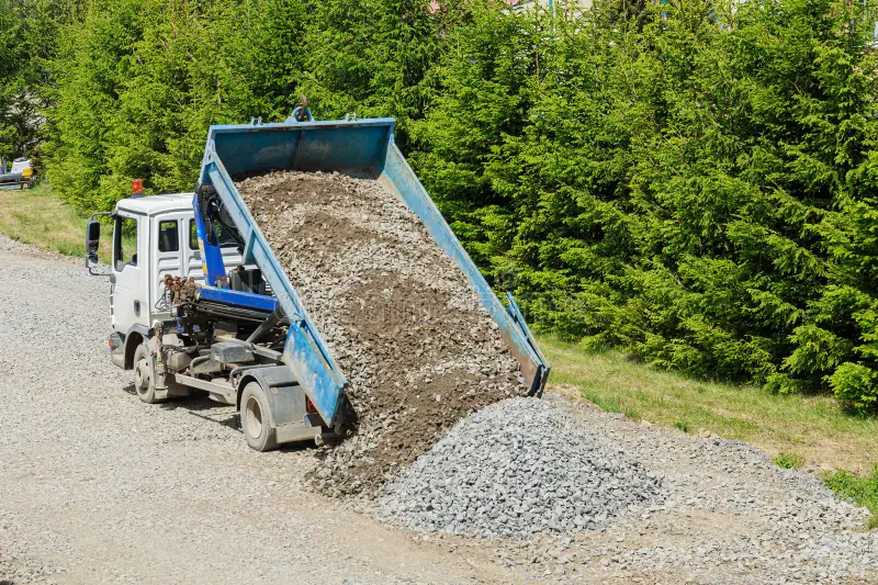 there-dump-truck-construction-site-dumping-gravel-ground-unloading-gravel-dump-truck-has-271463320.webp